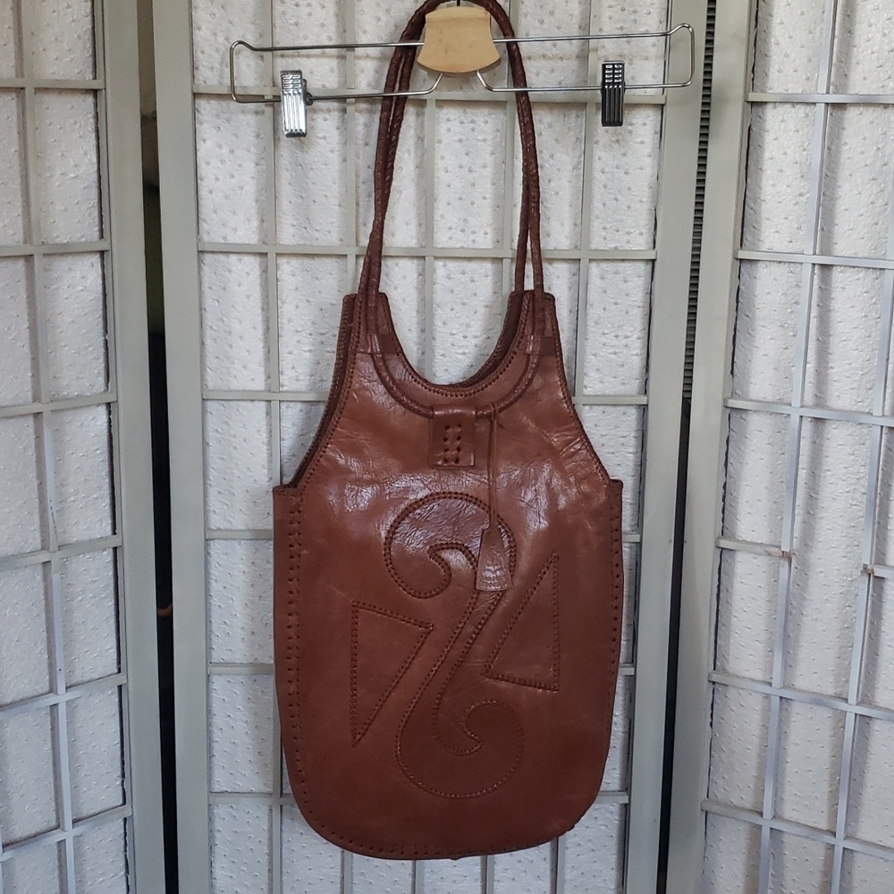 Cognac leather artesanal Indonesia shoulder bag